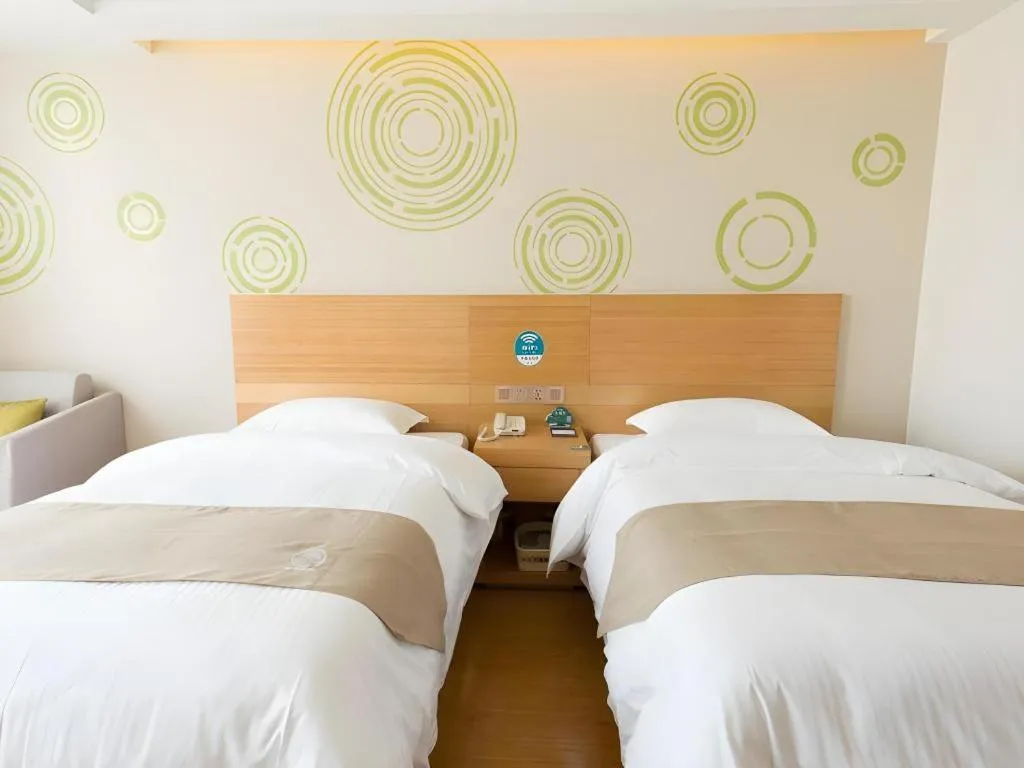 Bed in GreenTree Inn Maanshan Hanshan District Jiuwu Square Hotel