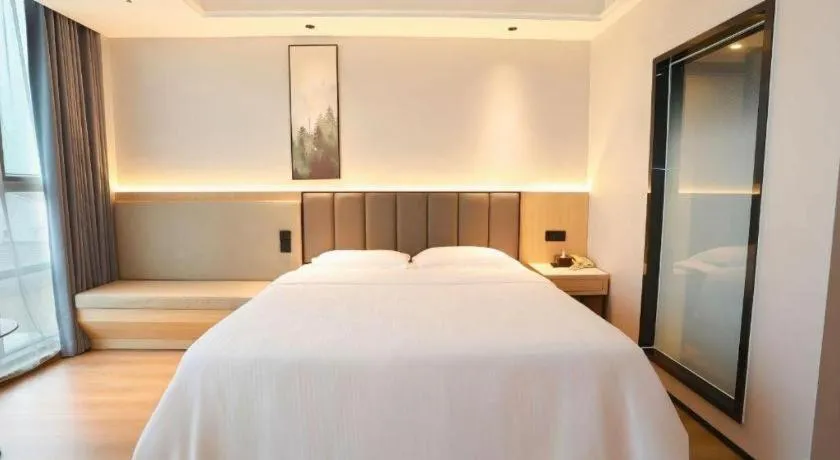 Bed in GreenTree Inn Maanshan Hanshan District Jiuwu Square Hotel