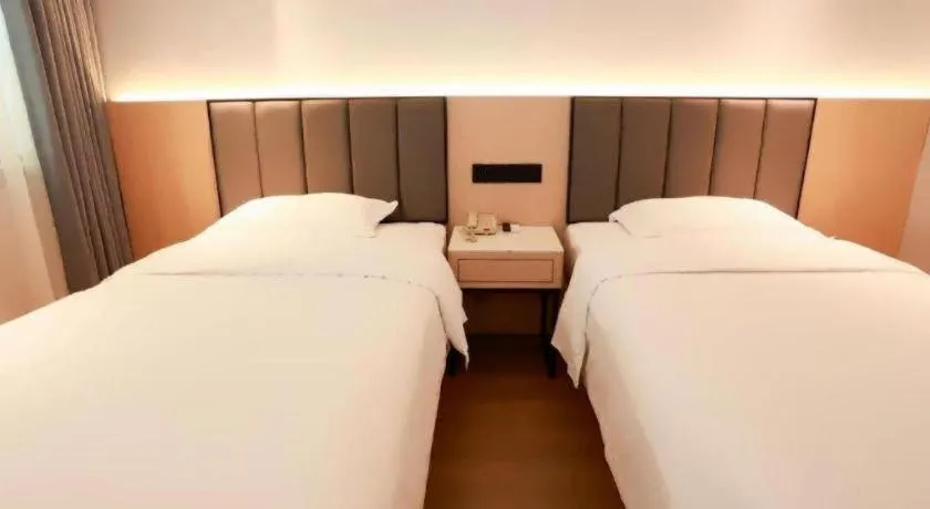 Bed in GreenTree Inn Maanshan Hanshan District Jiuwu Square Hotel