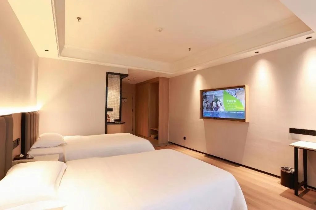 Bed in GreenTree Inn Maanshan Hanshan District Jiuwu Square Hotel