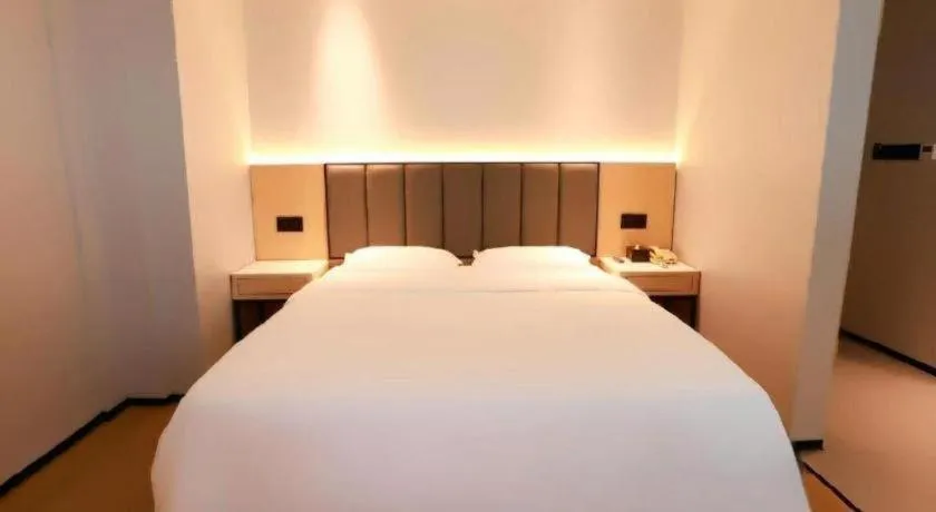 Bed in GreenTree Inn Maanshan Hanshan District Jiuwu Square Hotel