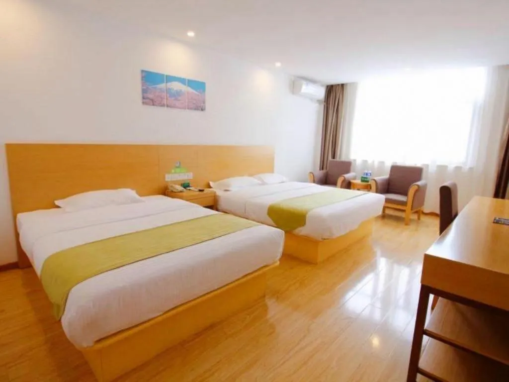 Bed in GreenTree Alliance Suzhou Zhangjiagang Nanfeng Town Hotel