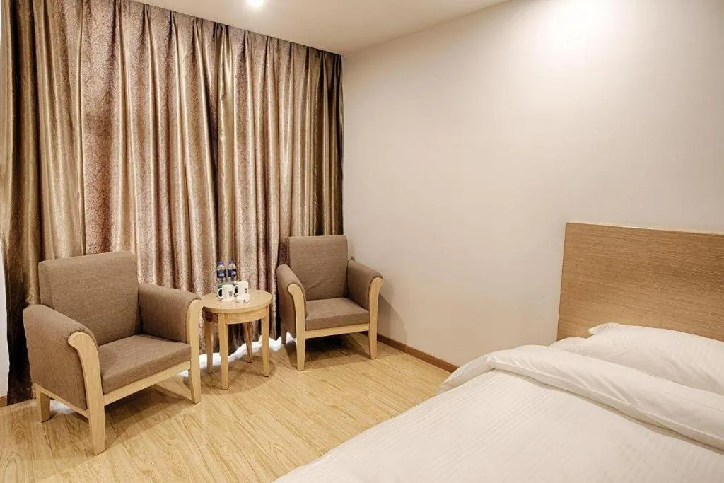 Bed in GreenTree Alliance Suzhou Zhangjiagang Nanfeng Town Hotel