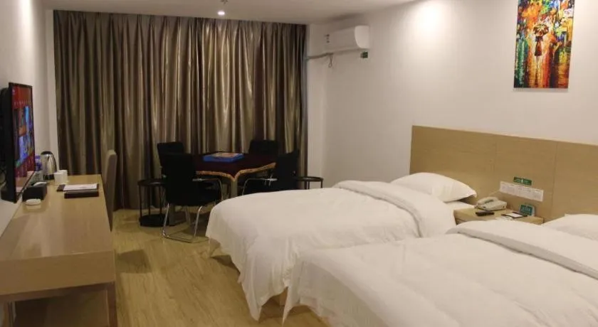 Bed in GreenTree Alliance Suzhou Zhangjiagang Nanfeng Town Hotel