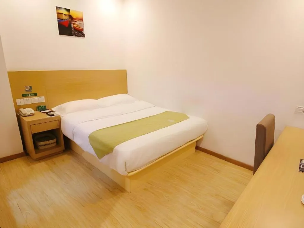 Bed in GreenTree Alliance Suzhou Zhangjiagang Nanfeng Town Hotel