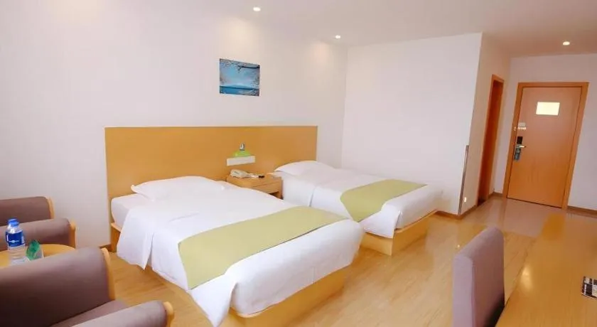 Bed in GreenTree Alliance Suzhou Zhangjiagang Nanfeng Town Hotel