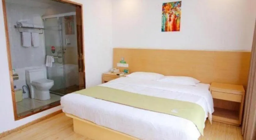 Bed in GreenTree Alliance Suzhou Zhangjiagang Nanfeng Town Hotel