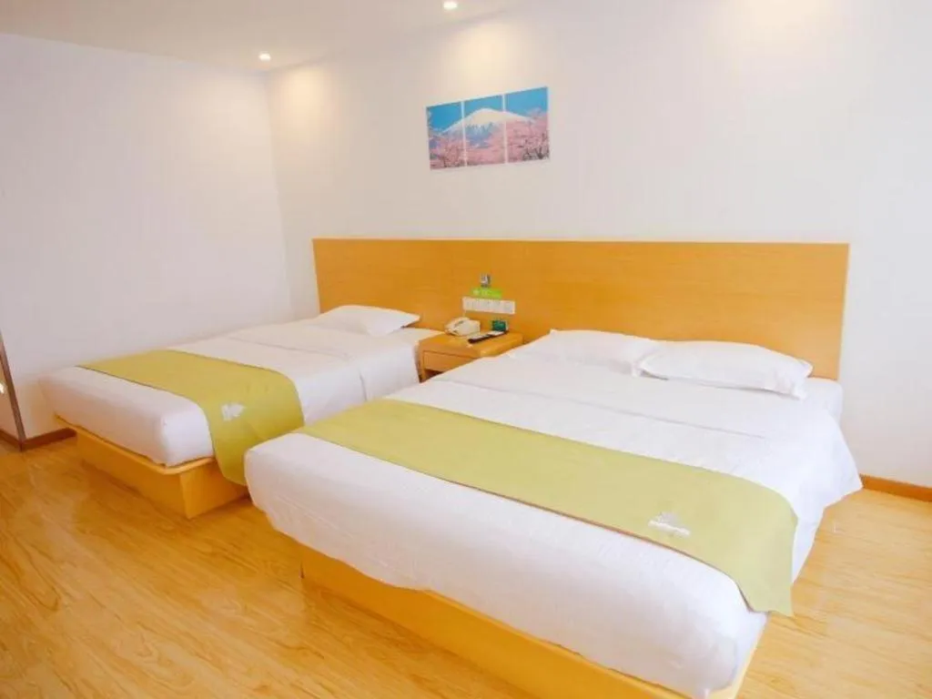 Bed in GreenTree Alliance Suzhou Zhangjiagang Nanfeng Town Hotel