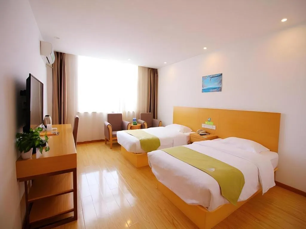 Bed in GreenTree Alliance Suzhou Zhangjiagang Nanfeng Town Hotel