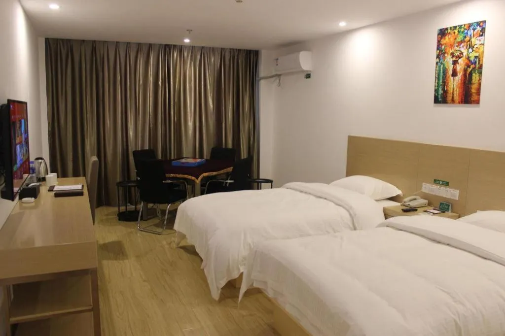Bed in GreenTree Alliance Suzhou Zhangjiagang Nanfeng Town Hotel