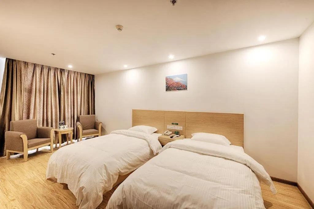 Bed in GreenTree Alliance Suzhou Zhangjiagang Nanfeng Town Hotel