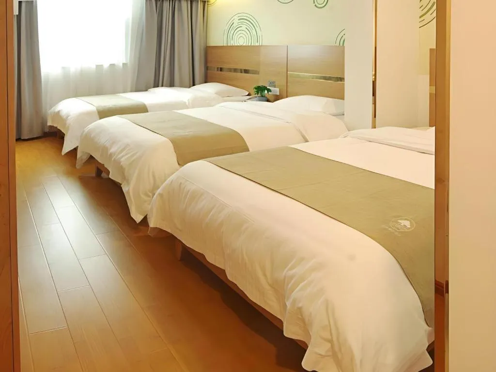 Bed in GreenTree Inn Fuzhou Eastern Capital Express Hotel