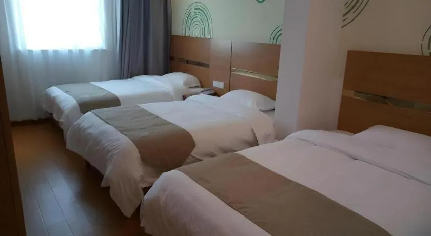 Bed in GreenTree Inn Fuzhou Eastern Capital Express Hotel