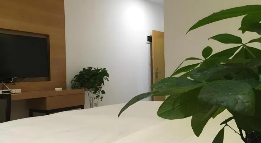 Bed in GreenTree Inn Fuzhou Eastern Capital Express Hotel