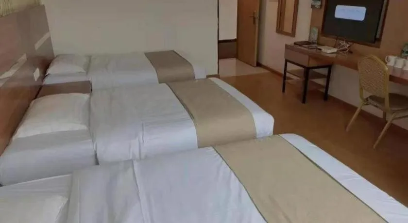 Bed in GreenTree Inn Fuzhou Eastern Capital Express Hotel