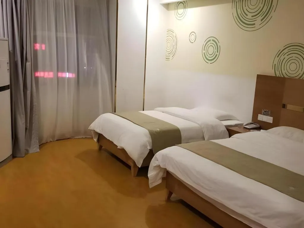 Bed in GreenTree Inn Fuzhou Eastern Capital Express Hotel