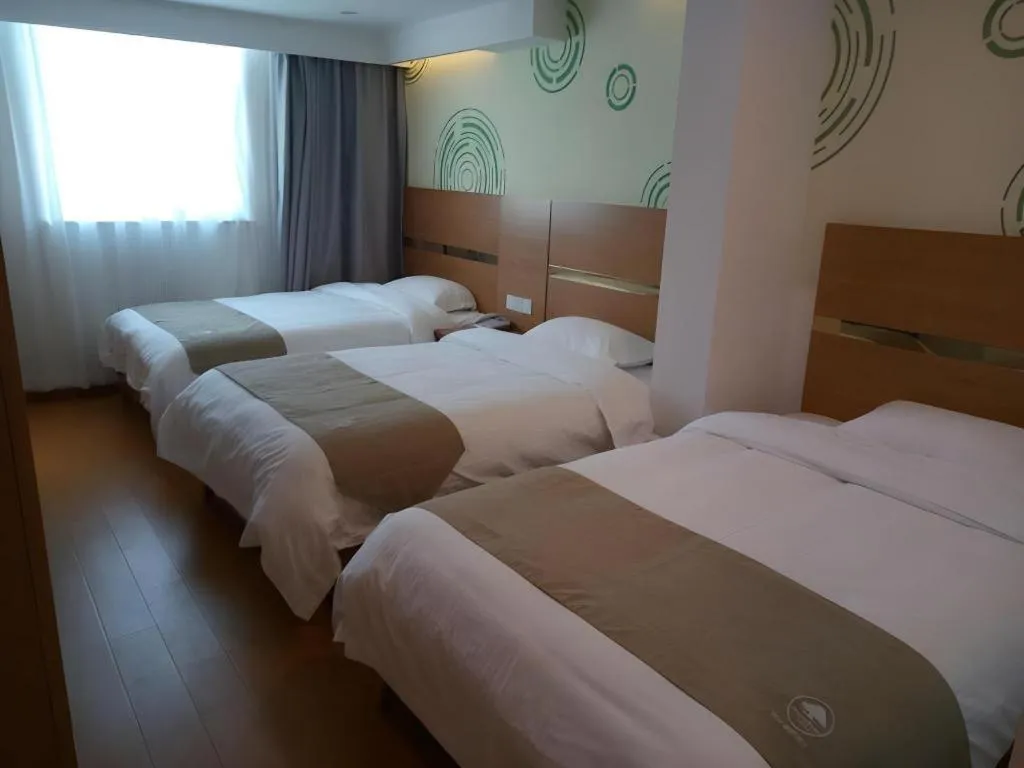 Bed in GreenTree Inn Fuzhou Eastern Capital Express Hotel
