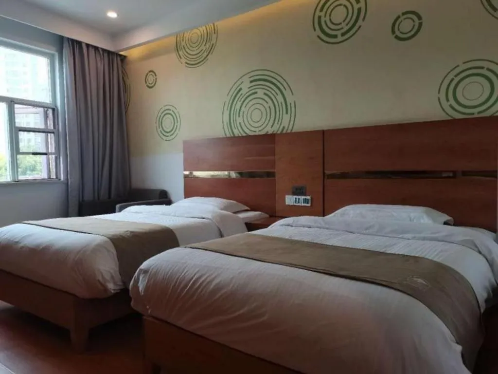 Bed in GreenTree Inn Fuzhou Eastern Capital Express Hotel