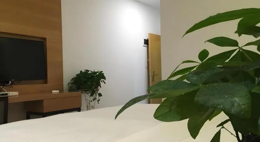 Bed in GreenTree Inn Fuzhou Eastern Capital Express Hotel