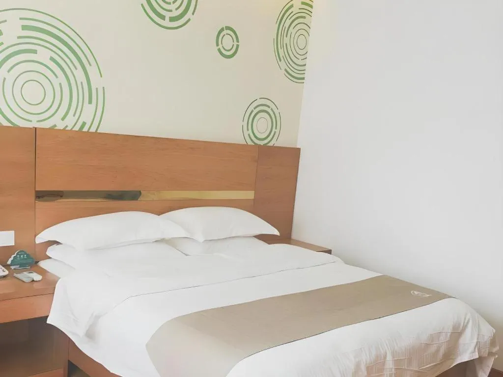 Bed in GreenTree Inn Fuzhou Eastern Capital Express Hotel