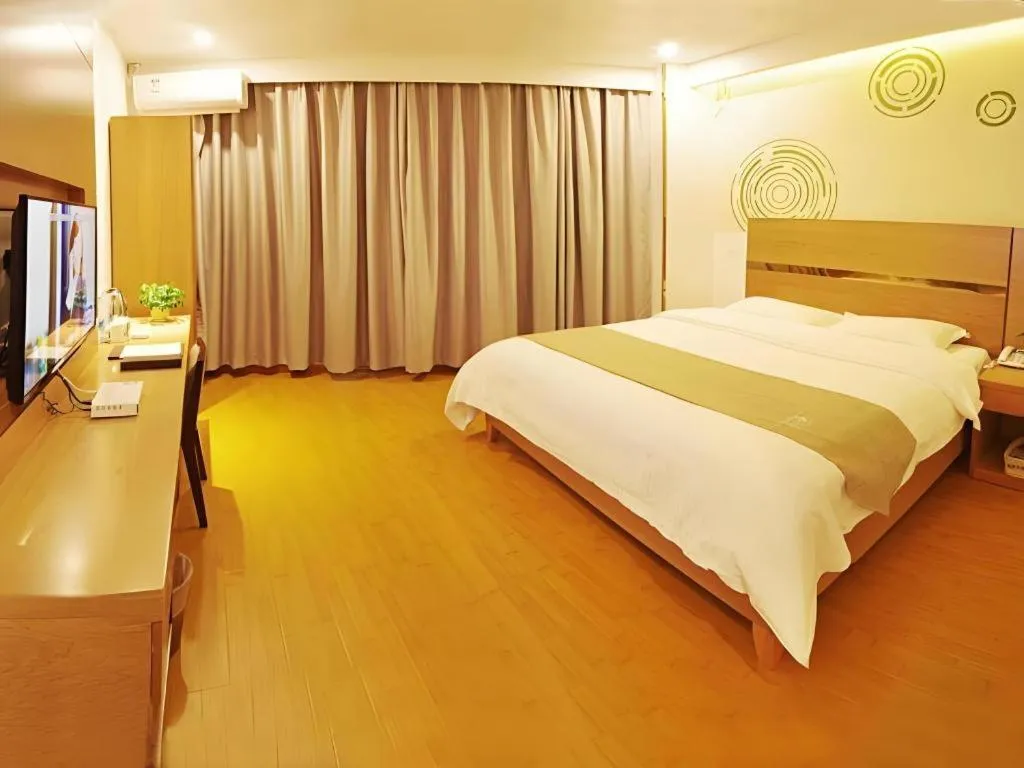 Bed in GreenTree Inn Fuzhou Eastern Capital Express Hotel