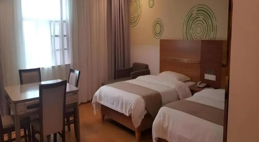 Bed in GreenTree Inn Fuzhou Eastern Capital Express Hotel