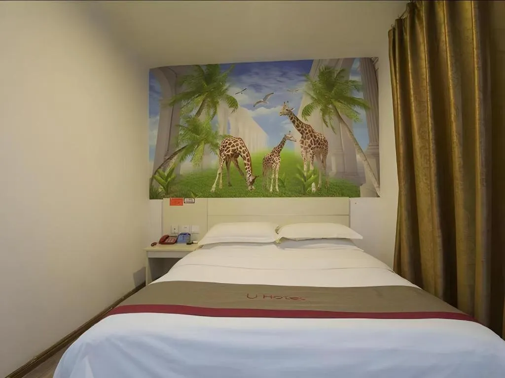 Bed in JUNYI Hotel Jiangxi Xinyu Baoshi Park