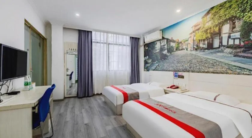 Bed in JUNYI Hotel Jiangxi Xinyu Baoshi Park