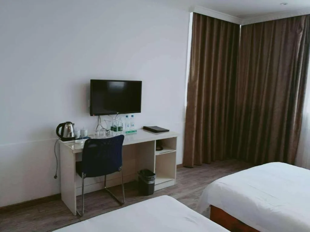 Bed in JUNYI Hotel Jiangxi Xinyu Baoshi Park