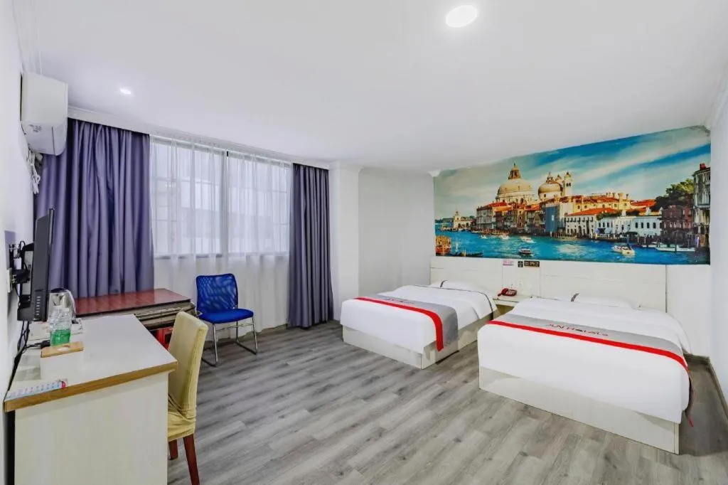 Bed in JUNYI Hotel Jiangxi Xinyu Baoshi Park