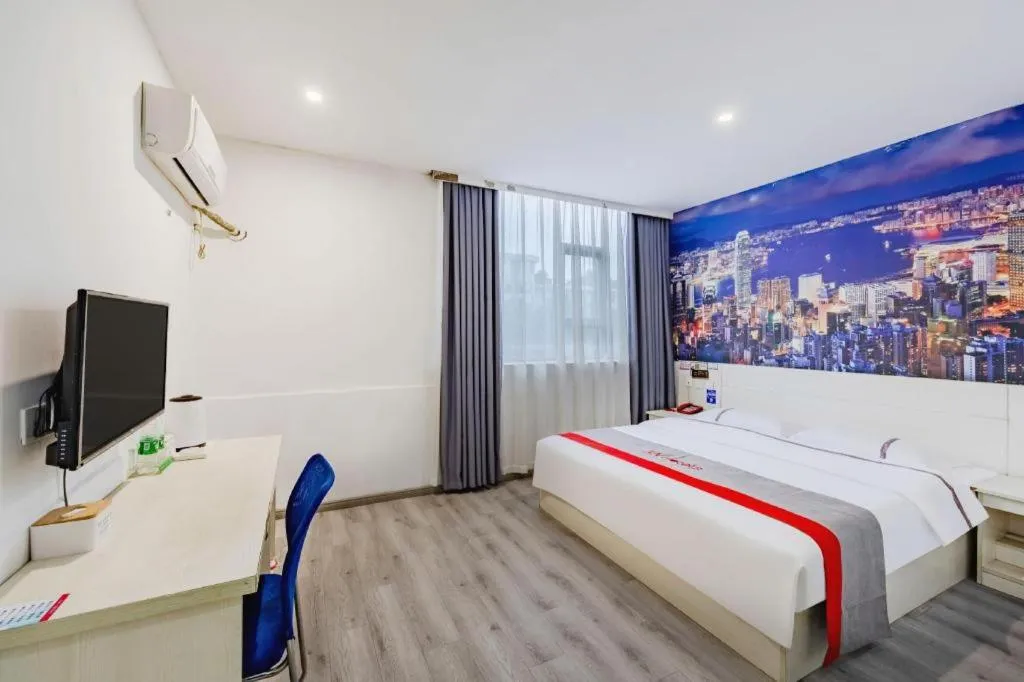 Bed in JUNYI Hotel Jiangxi Xinyu Baoshi Park