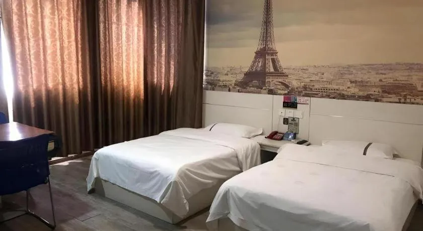 Bed in JUNYI Hotel Jiangxi Xinyu Baoshi Park