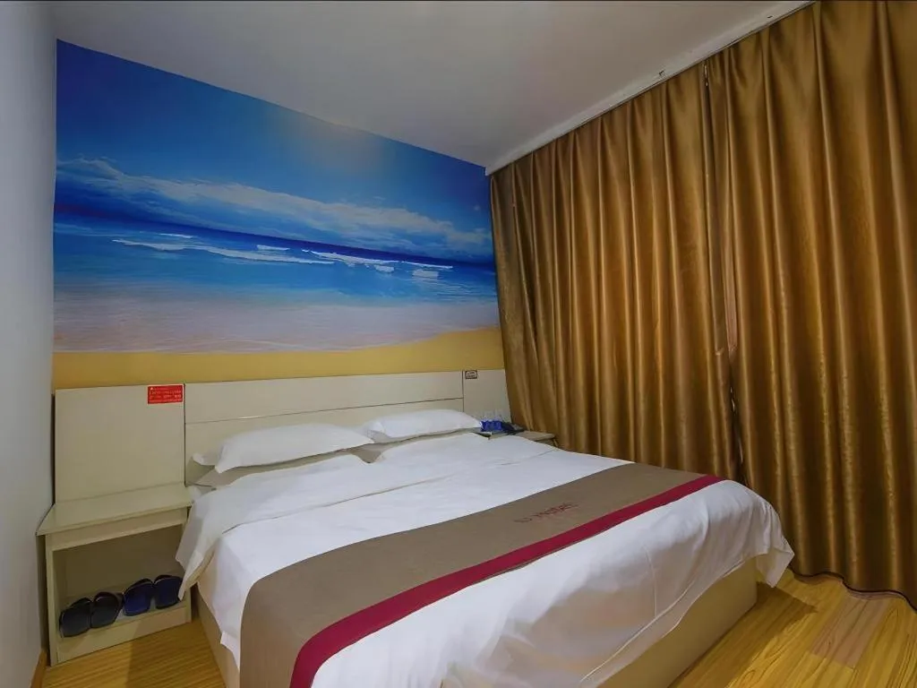 Bed in JUNYI Hotel Jiangxi Xinyu Baoshi Park