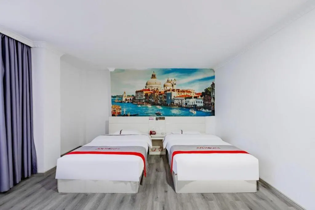 Bed in JUNYI Hotel Jiangxi Xinyu Baoshi Park