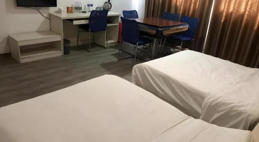 Bed in JUNYI Hotel Jiangxi Xinyu Baoshi Park