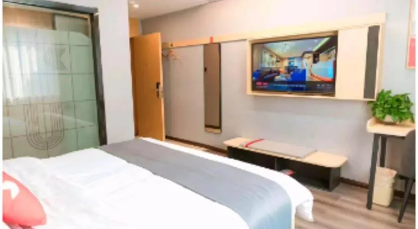 Bed in JUNYI Hotel Jiangxi Xinyu Baoshi Park