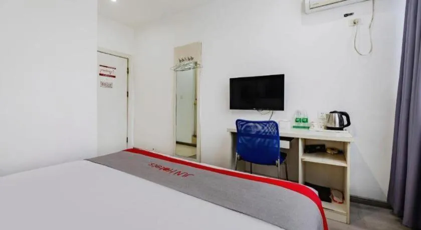 Bed in JUNYI Hotel Jiangxi Xinyu Baoshi Park