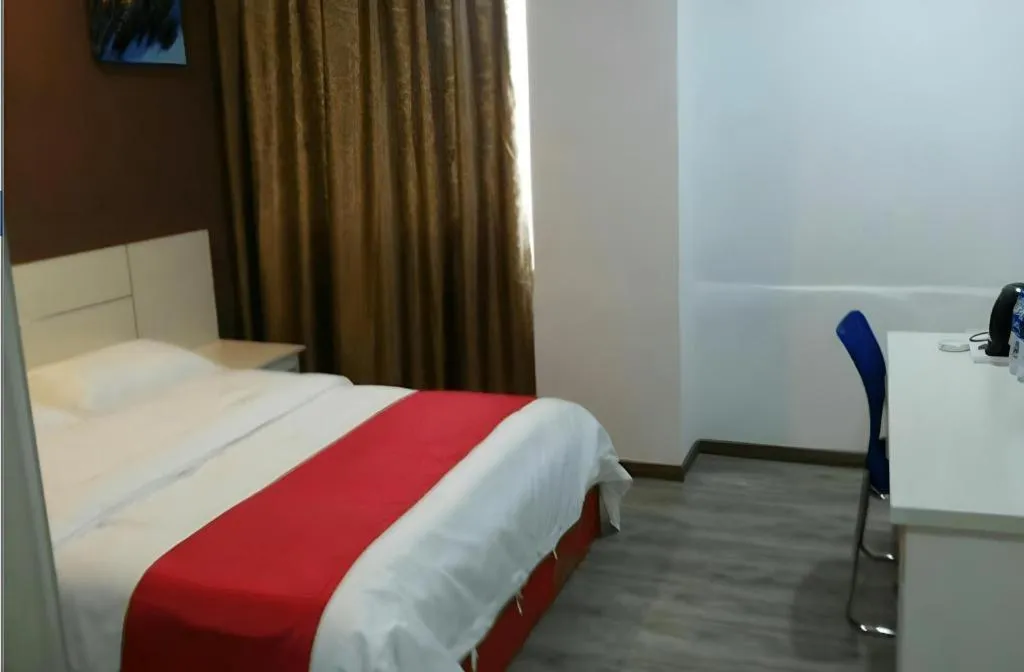 Bed in JUNYI Hotel Jiangxi Xinyu Baoshi Park