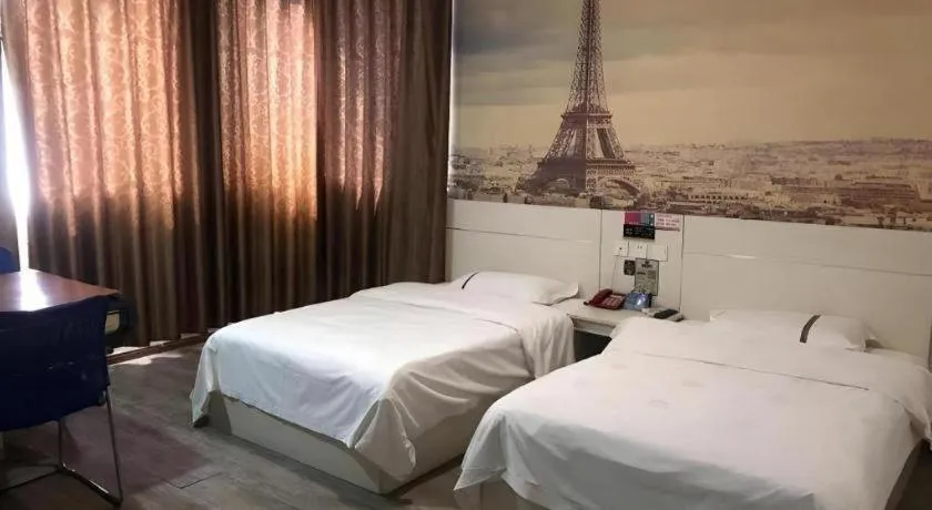 Bed in JUNYI Hotel Jiangxi Xinyu Baoshi Park