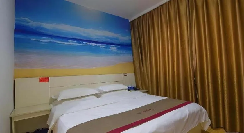 Bed in JUNYI Hotel Jiangxi Xinyu Baoshi Park