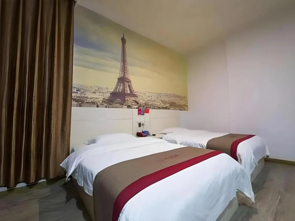 Bed in JUNYI Hotel Jiangxi Xinyu Baoshi Park