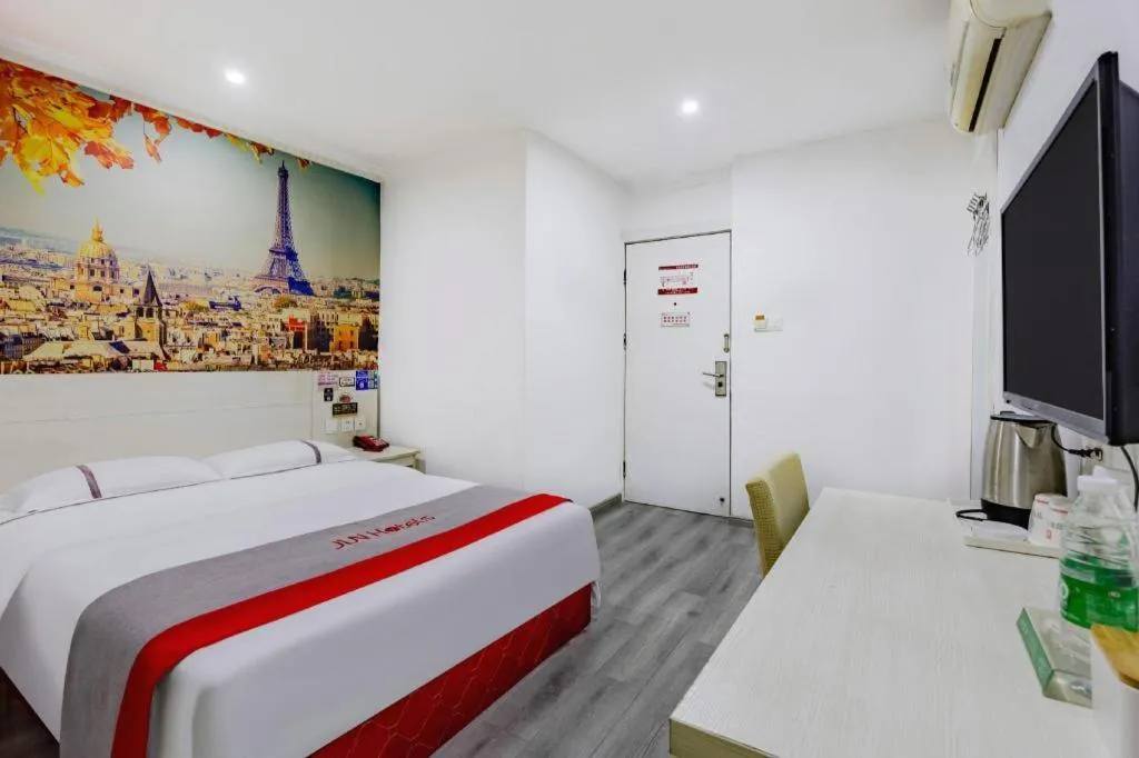 Bed in JUNYI Hotel Jiangxi Xinyu Baoshi Park