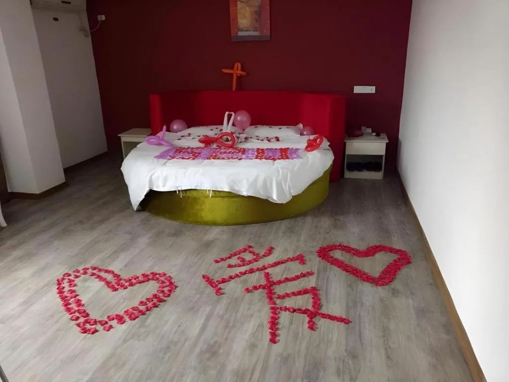 Bed in JUNYI Hotel Jiangxi Xinyu Baoshi Park