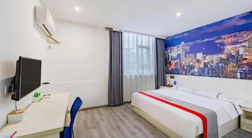 Bed in JUNYI Hotel Jiangxi Xinyu Baoshi Park