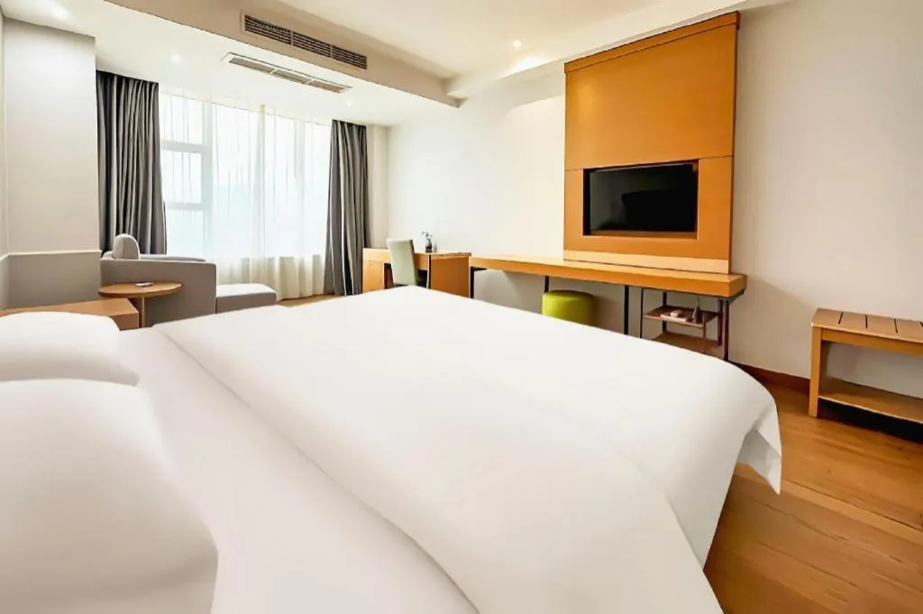 Bed in GreenTree Inn Ningbo Hangzhou Wan New District Lishi Square Business Hotel