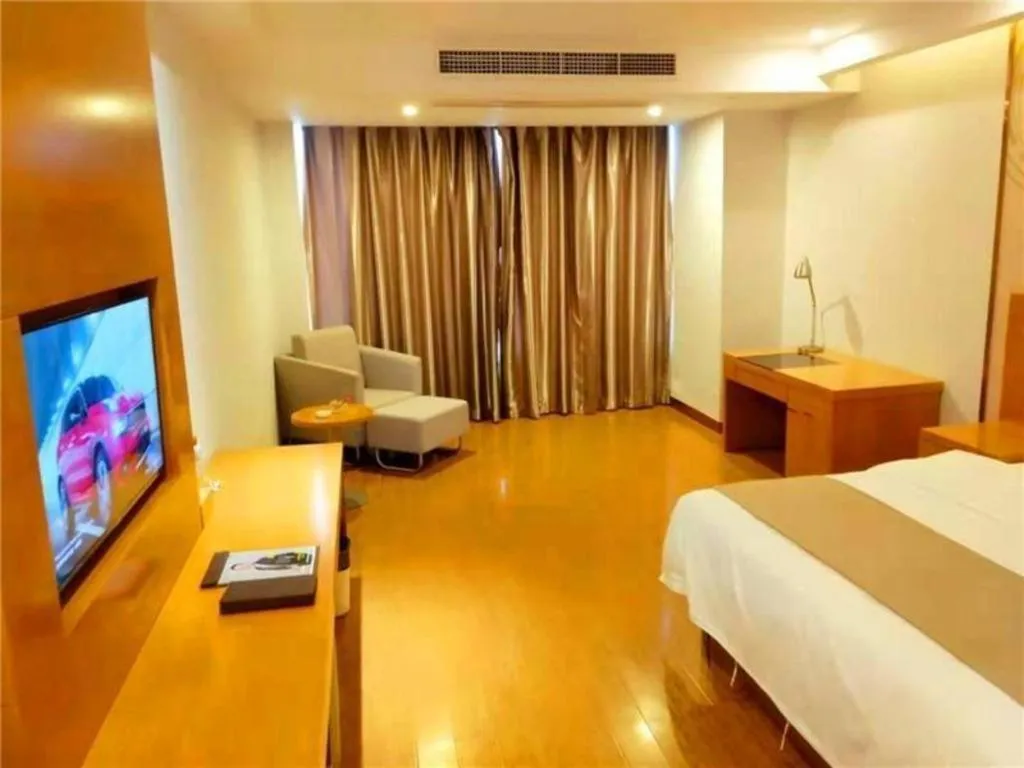 Bed in GreenTree Inn Ningbo Hangzhou Wan New District Lishi Square Business Hotel