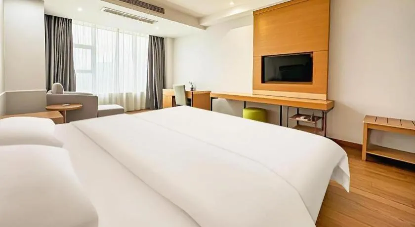 Bed in GreenTree Inn Ningbo Hangzhou Wan New District Lishi Square Business Hotel