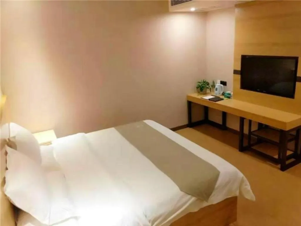 Bed in GreenTree Inn Ningbo Hangzhou Wan New District Lishi Square Business Hotel