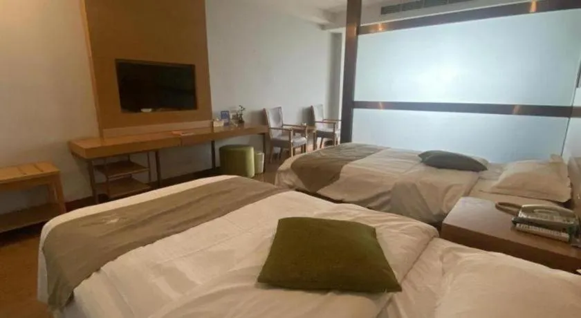 Bed in GreenTree Inn Ningbo Hangzhou Wan New District Lishi Square Business Hotel