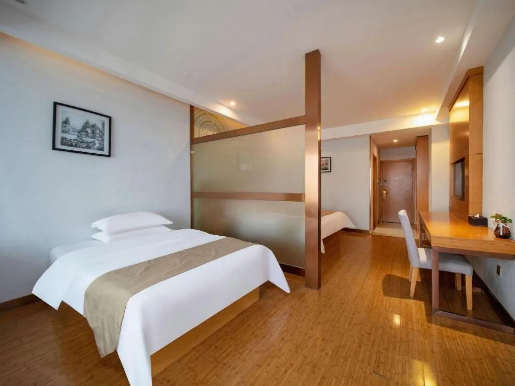 Bed in GreenTree Inn Ningbo Hangzhou Wan New District Lishi Square Business Hotel